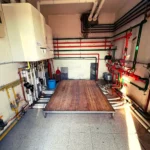Centrale termica in palazzina (fronte) - lavori realizzato dalla Passerini Marco Impianti Idrotermosanitari - idraulico provincia Perugia